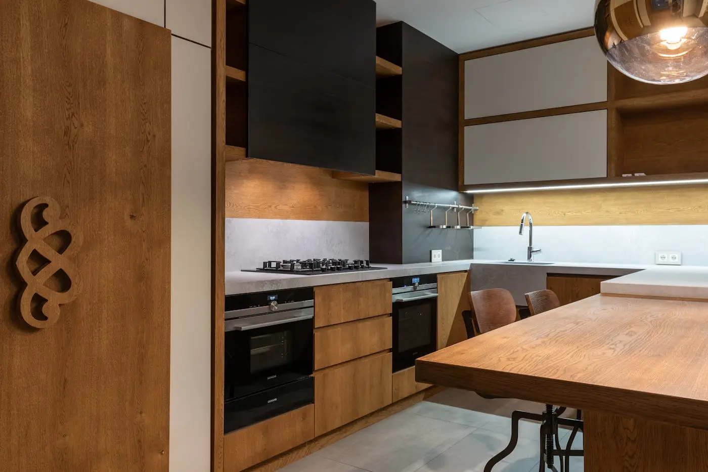 Modern shaker kitchen with an island and timber worktops